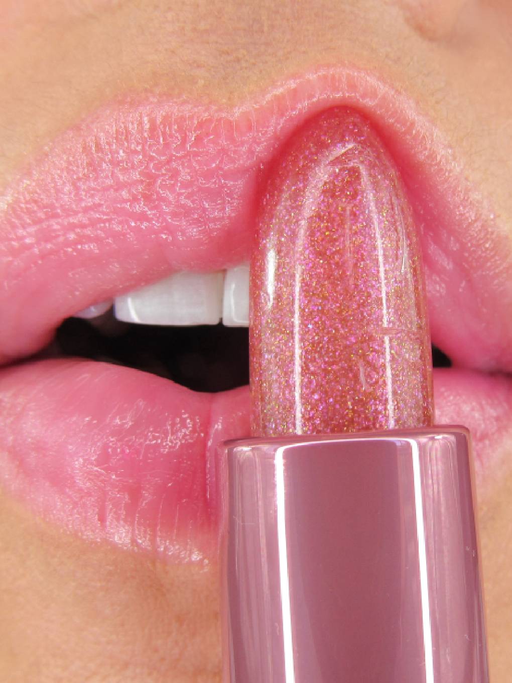 up close of model applying pink opal ph balm to upper lip up close of model applying pink opal ph balm to upper lip