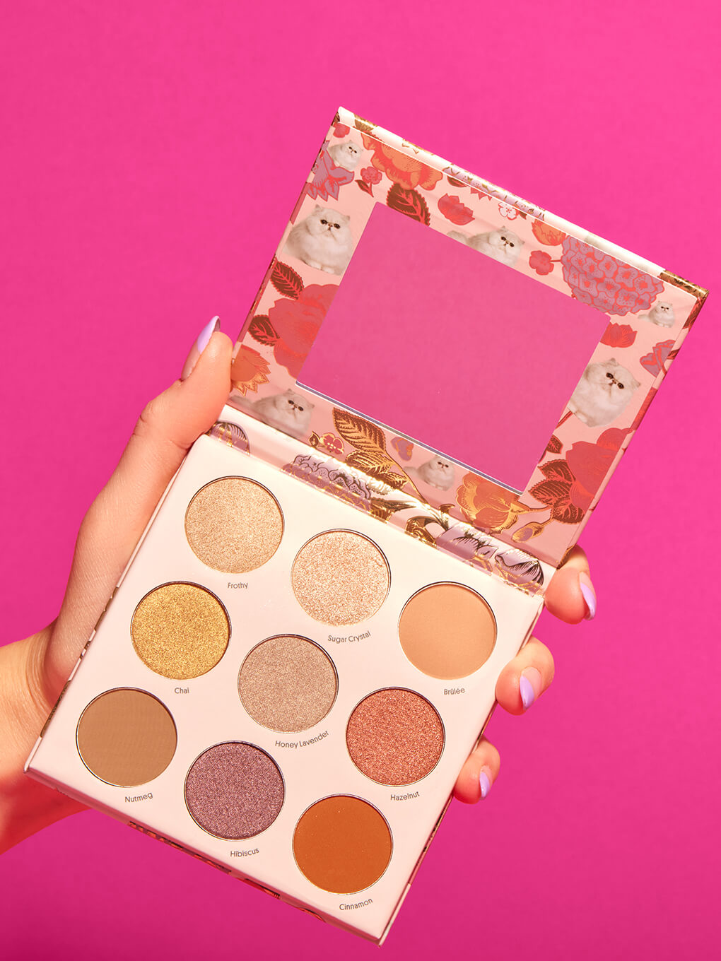 single latte kitten neutral eyeshadow palettes open on pink background