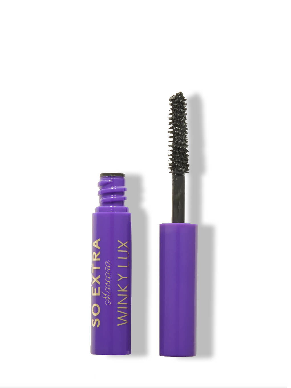 mini so extra volumizing mascara on white background