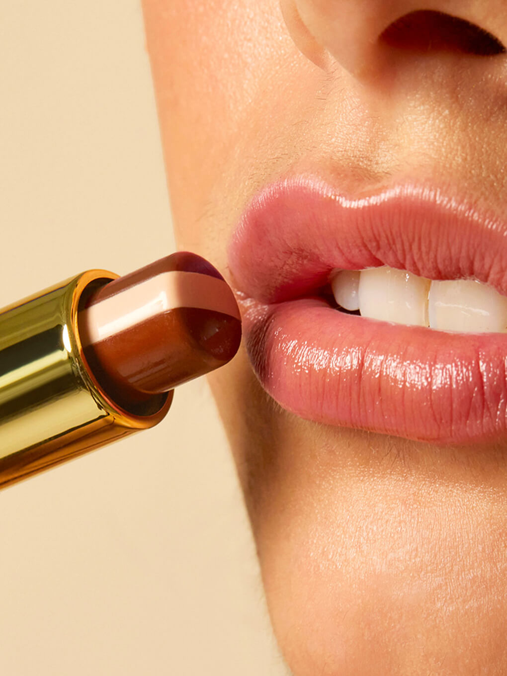 model close up applying affogato nude lip balm