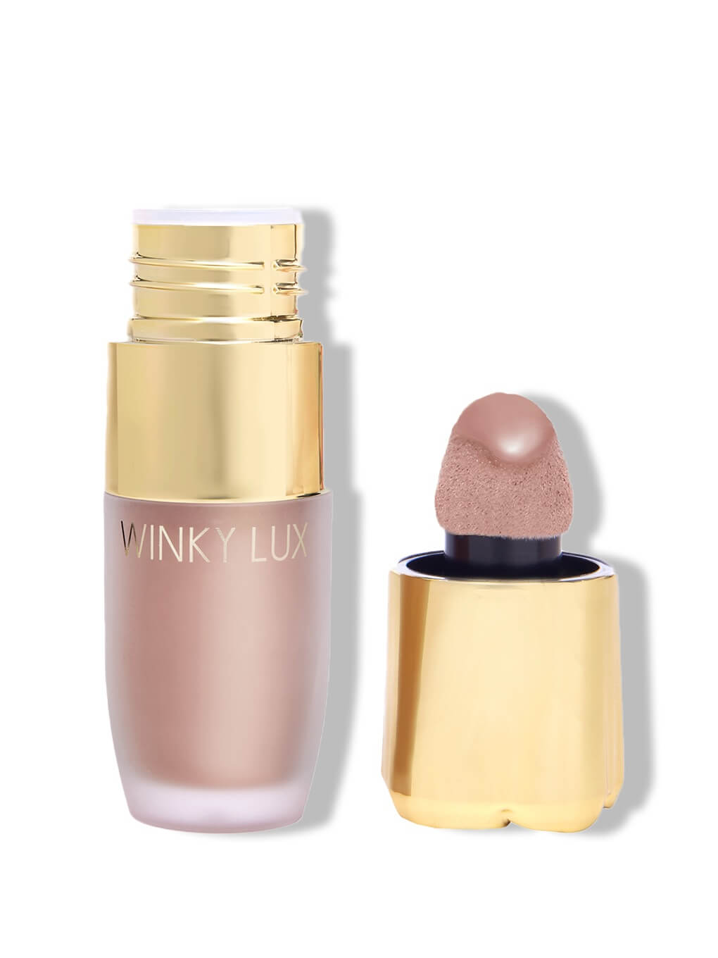 Angel -- cheeky rose liquid highlighter with cap next to on white background