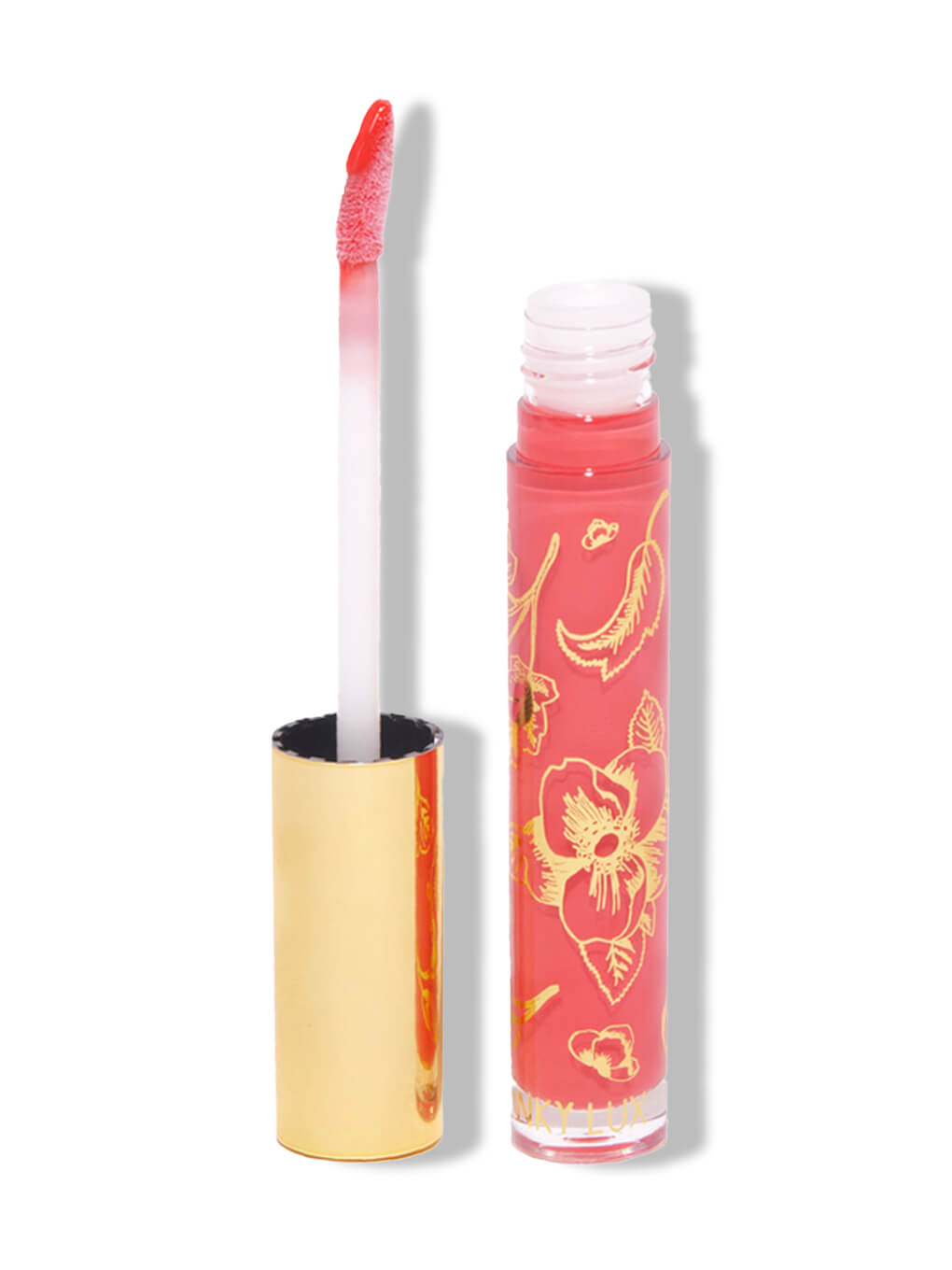 Juicy -- glossy boss lip gloss cap off on white background