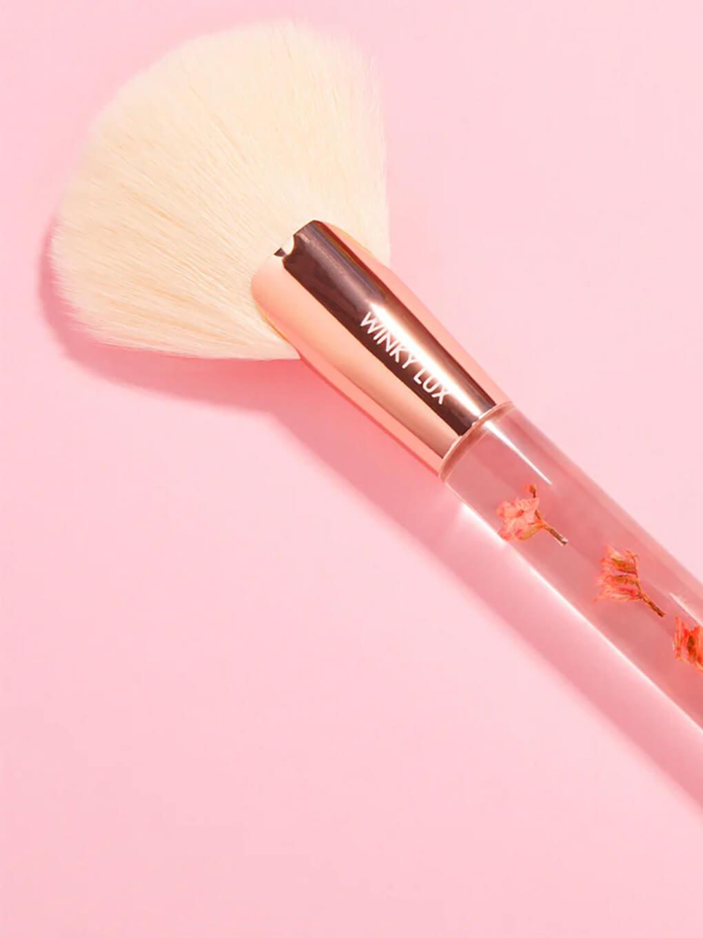 forever flower big makeup brush on white background