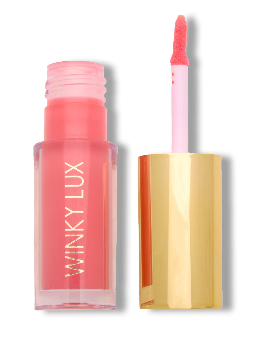 Juicy -- bright pink tinted lip oil with cap off on white background