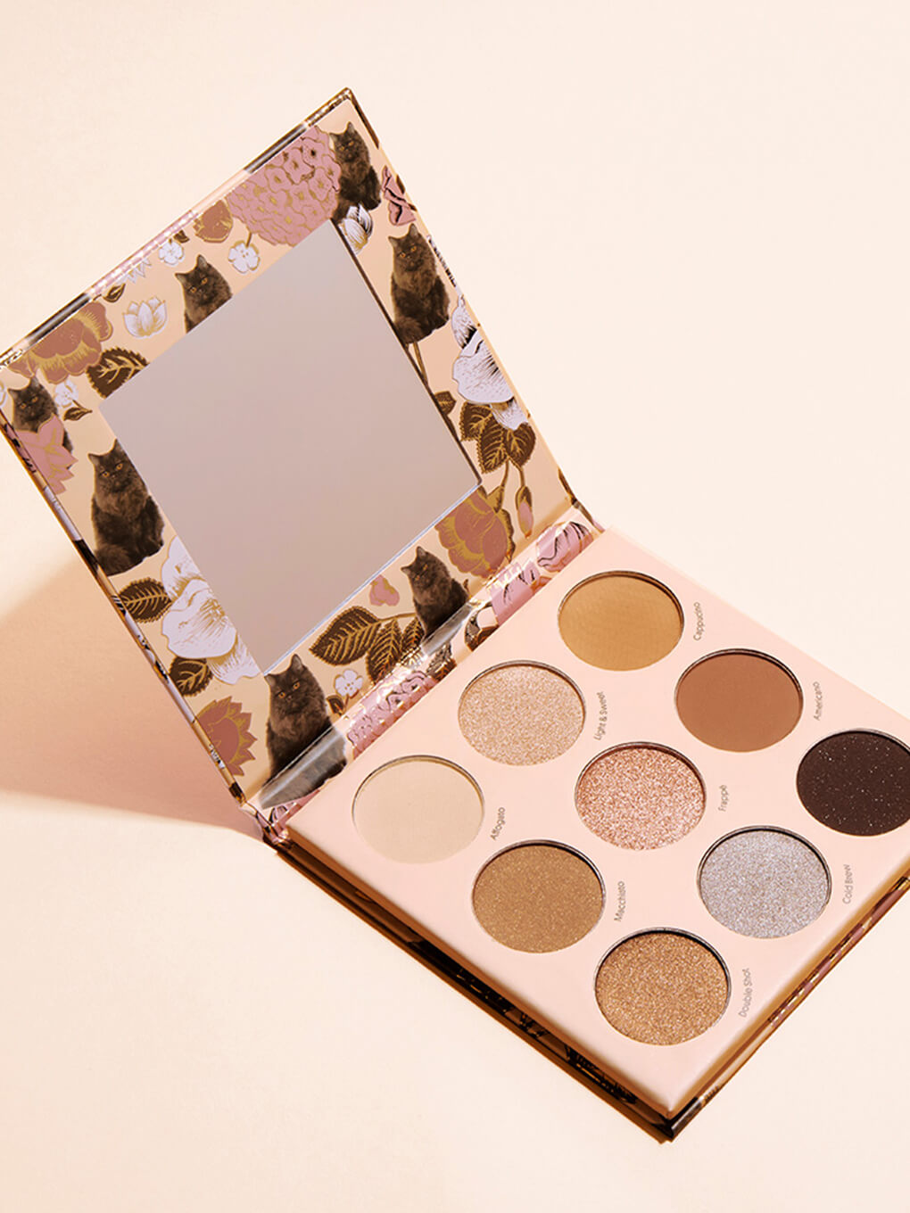 single coffee kitten neutral eyeshadow palettes open on beige background