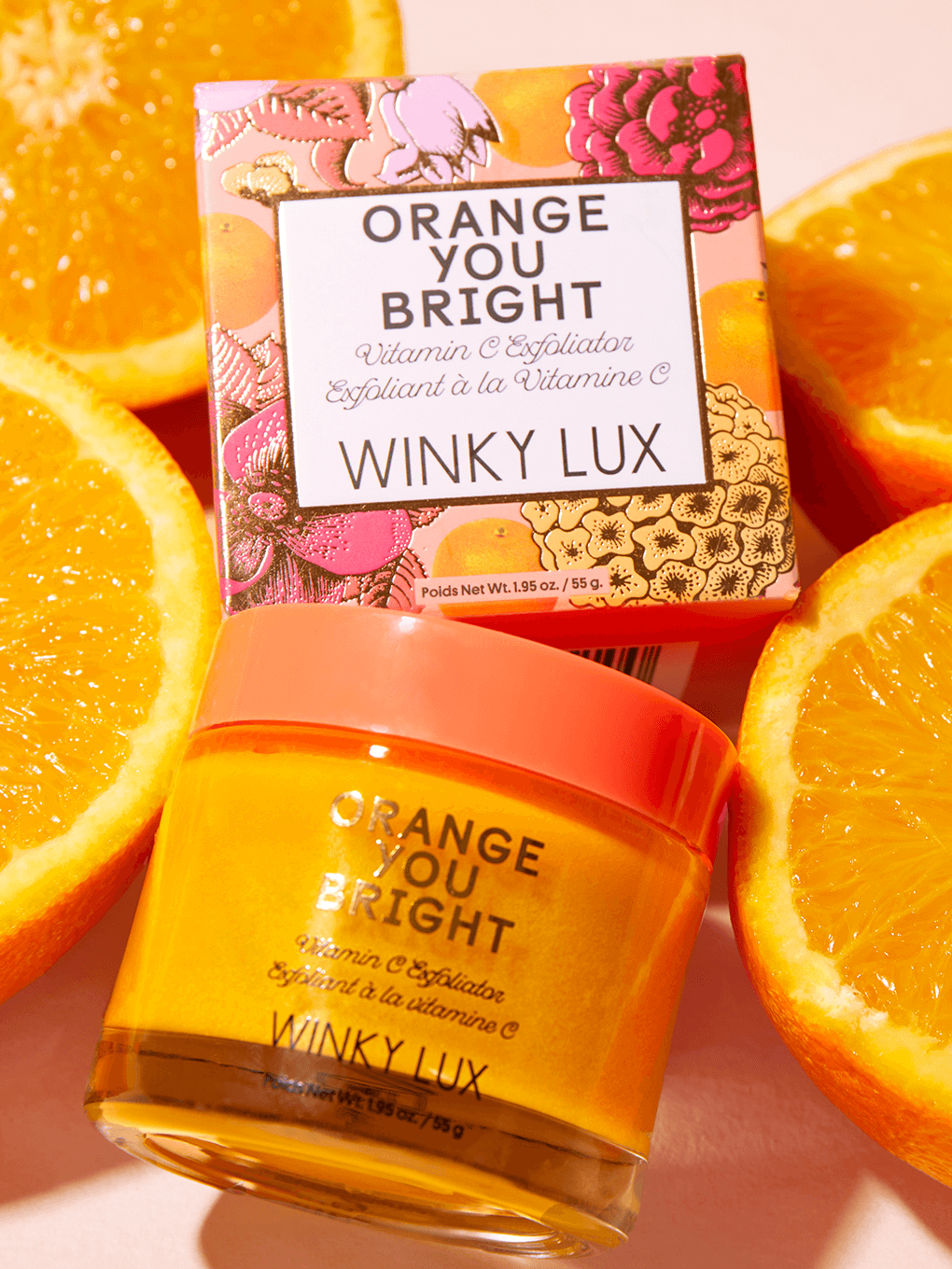 orange you bright vitamin c exfoliator with box nestled in bed of oranges